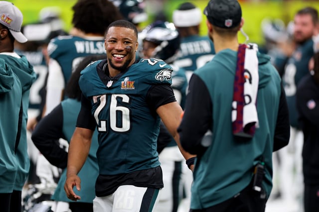 Saquon Barkley #26 of the Philadelphia Eagles looks on from the sideline in the fourth quarter against the Kansas City Chiefs during Super Bowl LIX at Caesars Superdome on February 09, 2025 in New Orleans, Louisiana.