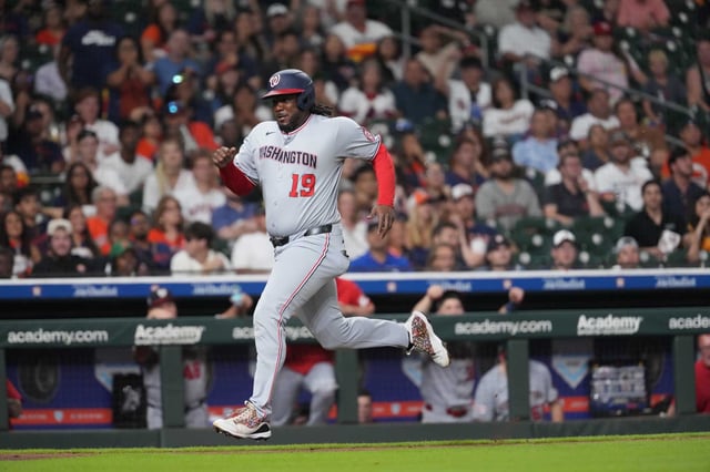 Washington Nationals Josh Bell (19) scores the first home run for the Nationals tying the game at Daikin Park during the sixth inning in Houston, Monday, July 28, 2025.
