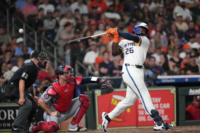 Houston Astros Taylor Trammell (26) hits the ball during the sixth inning against the Nationals at Daikin Park in Houston, Monday, July 28, 2025.