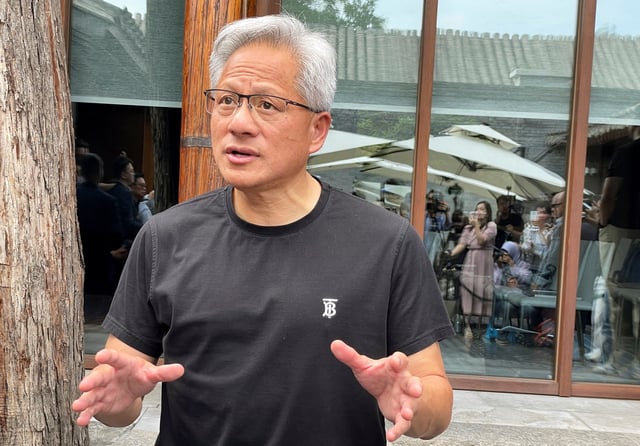 Nvidia CEO Jensen Huang speaks to the media at a hotel in Beijing, China July 16, 2025. REUTERS/Alessandro Diviggiano