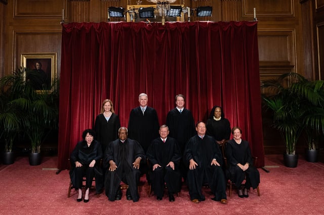 Justices of the US Supreme Court during a formal group photograph at the Supreme Court in Washington, DC, US, on Friday, Oct. 7, 2022. Seated from left: Associate Justice Sonia Sotomayor, Associate Justice Clarence Thomas, Chief Justice John Roberts, Associate Justice Samuel Alito Jr. and Associate Justice Elena Kagan. Standing from left: Associate Justice Amy Coney Barrett, Associate Justice Neil Gorsuch, Associate Justice Brett Kavanaugh and Associate Justice Ketanji Brown Jackson. The court opened its new term Monday with a calendar already full of high-profile clashes, including two cases that could end the use of race in college admissions. Photographer: Eric Lee/Bloomberg via Getty Images