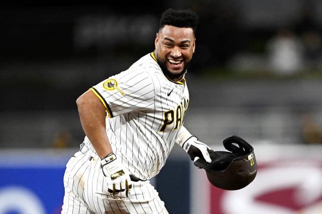 Jul 28, 2025; San Diego, California, USA; San Diego Padres catcher Elias Diaz (17) celebrates after hitting a walk-off single during the ninth inning against the New York Mets at Petco Park. Mandatory Credit: Denis Poroy-Imagn Images
