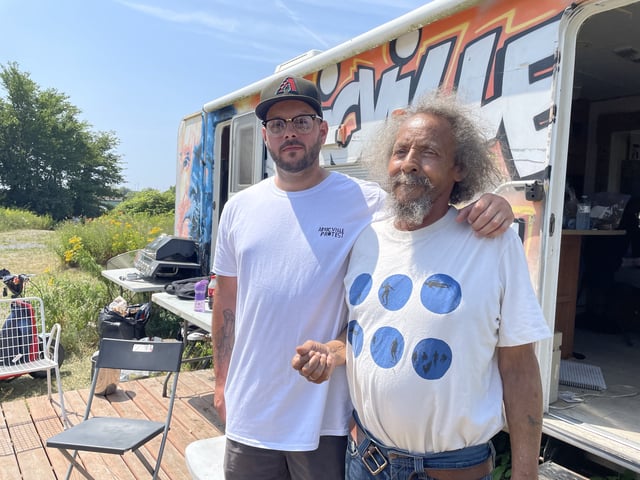 Eddie Carvery III, left, and his grandfather, Eddie Carvery are fighting against a parking ticket issued against the trailer that's been on the property of the Africville Museum for the past four years.