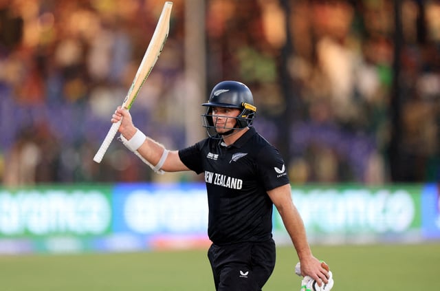 Cricket - ICC Men's Champions Trophy - Group A - Pakistan v New Zealand - National Stadium, Karachi, Pakistan - February 19, 2025 New Zealand's Tom Latham raises his bat to acknowledge the crowd after the end of first innings REUTERS/Akhtar Soomro/File Photo