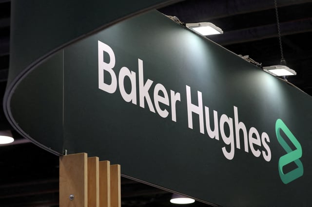 The logo of energy services firm Baker Hughes is displayed during the LNG 2023 energy trade show in Vancouver, British Columbia, Canada, July 12, 2023. REUTERS/Chris Helgren/File Photo