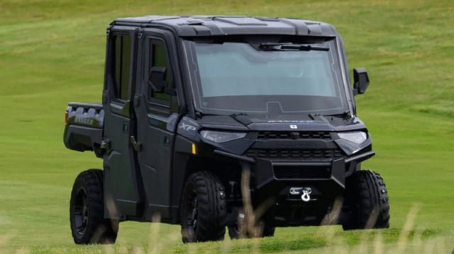 President Donald Trump has a new heavily armoured golf cart dubbed "Golf Force One" which followed him as he played Turnberry.