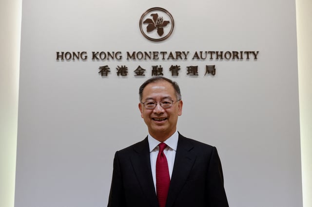 Eddie Yue Wai-man, Chief Executive of the Hong Kong Monetary Authority (HKMA) poses for a picture during an interview with Reuters in Hong Kong, China November 4, 2022. REUTERS/Tyrone Siu/File Photo