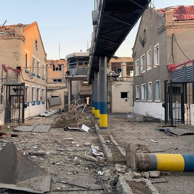 This photo provided by Ukraine's State Criminal Executive Service shows a damaged prison in the village of Bilenke, in Ukraine's Zaporizhzhia region, following a Russian bomb attack that killed at least 17 inmates, on Tuesday, July 29, 2025. (Ukraine's State Criminal Executive Service via AP)