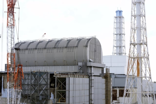 FILE - The Unit 3 reactor covered with protective housing at the Fukushima Daiichi nuclear power plant, run by Tokyo Electric Power Company Holdings (TEPCO), is seen in Okuma town, northeastern Japan on Monday Feb. 20, 2025. (AP Photo/Eugene Hoshiko, File)