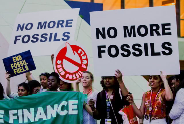 Climate activists protest against fossil fuels at Dubai's Expo City during the United Nations Climate Change Conference COP28 in Dubai, United Arab Emirates, December 12, 2023. REUTERS/Thomas Mukoya/File Photo