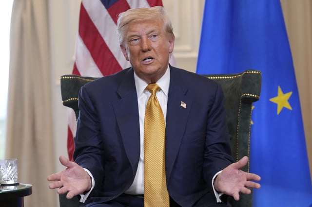 President Donald Trump gestures as he meets European Commission President Ursula von der Leyen at the Trump Turnberry golf course in Turnberry, Scotland Sunday, July 27, 2025.