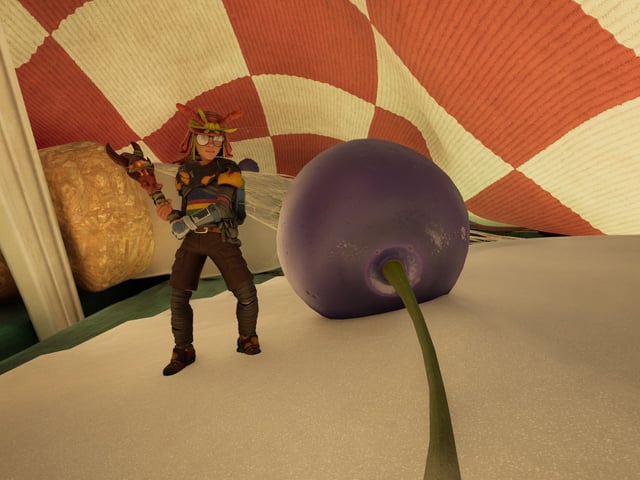 Grounded 2 blueberry leather chunks: A character wearing ant armour standing next to a blueberry under a picnic table cloth.