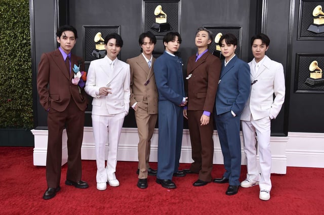 BTS arrives at the 64th annual Grammy Awards at the MGM Grand Garden Arena in Las Vegas in 2022. The group’s fiercely dedicated fans are known as ARMY.