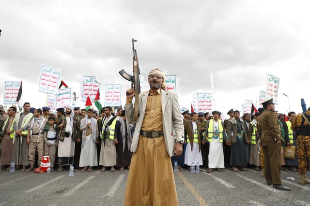 FILE - Houthi supporters attend a rally against the U.S.-led airstrikes on Yemen and in support of the Palestinians in the Gaza Strip on Yemen, in Sanaa, Yemen, Friday, Feb. 09, 2024. Despite a month of U.S.-led airstrikes, Yemen&#39;s Iranian-backed Houthi rebels have launched attacks seriously damaging a ship in the crucial Bab el-Mandeb Strait and apparently bringing down an American drone worth tens of millions of dollars.