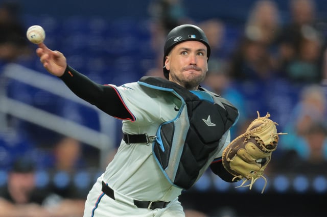 Jul 23, 2025; Miami, Florida, USA; Miami Marlins catcher Nick Fortes (4) throws to first base to retire San Diego Padres third baseman Manny Machado (not pictured) during the ninth inning at loanDepot Park. Mandatory Credit: Sam Navarro-Imagn Images/