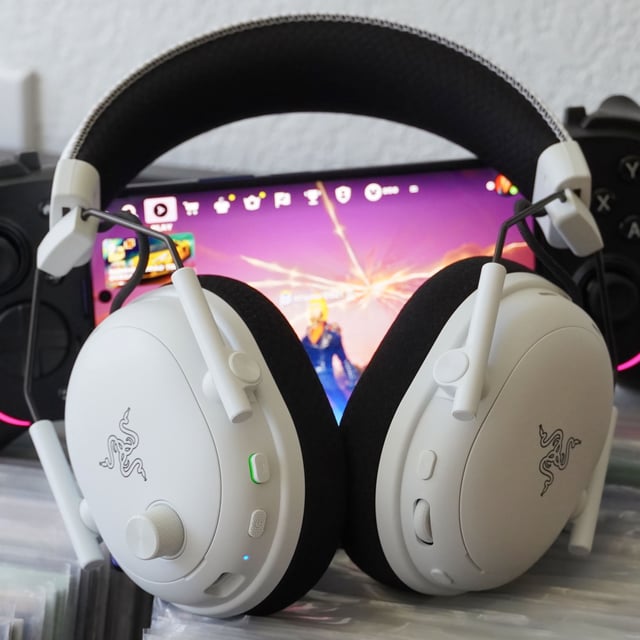 The Razer BlackShark V3 Pro gaming headset laid atop records.