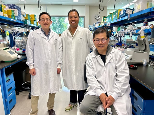 Scientists Wesley Wu, Nash Bulaong, and John Pak (from left to right), pictured at their lab in San Francisco on July 25, 2025, all contributed to the Virtual Lab paper showing how a group of AI scientists can contribute to original research. (CZ Biohub San Francisco)