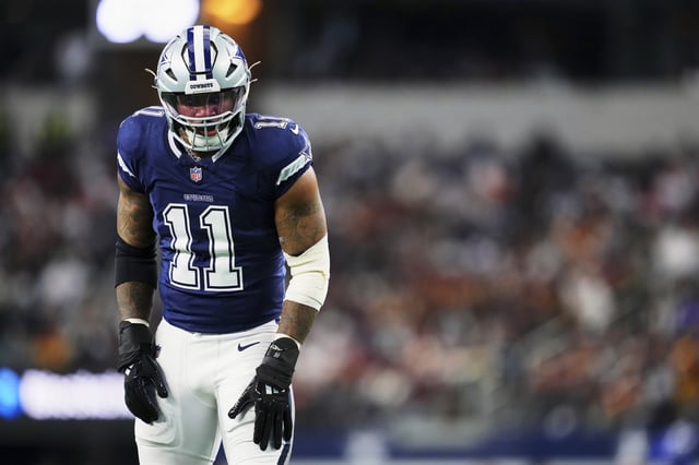 Micah Parsons #11 of the Dallas Cowboys defends against the Washington Commanders during an NFL football game at AT&amp;T Stadium on January 5, 2025 in Arlington, Texas.