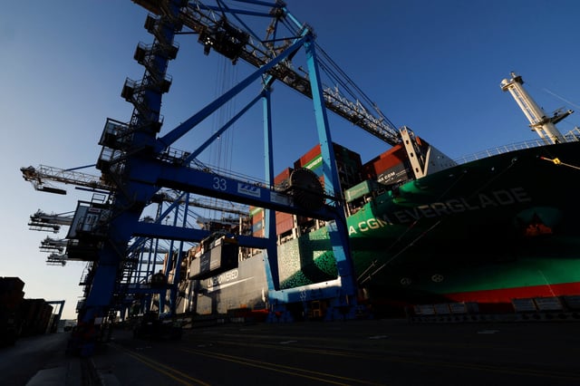 Containers are unloaded from the ship CMA CGM Everglade at Malta Freeport outside Birzebbuga, Malta, March 19, 2025. REUTERS/Darrin Zammit Lupi/File Photo