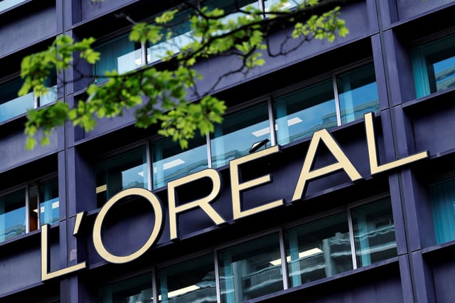 The logo of French cosmetics Groupe L'Oreal is seen on the L'Oreal group's headquarters building in Clichy, near Paris, France, April 14, 2025. REUTERS/Stephanie Lecocq/File Photo