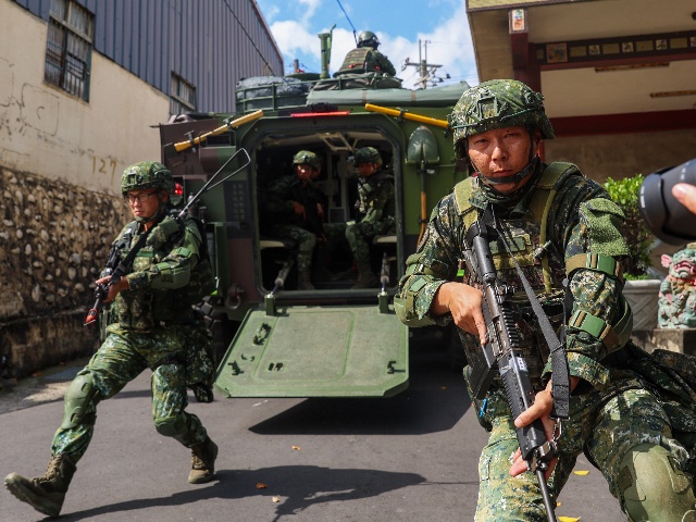 TAICHUNG, TAIWAN - JULY 16: Taiwanese soldiers partake in deep battle exercise simulating how to curb invading forces from pushing forward, as part of the ongoing Han Kuang military exercise, on the outskirts in Taichung, Taiwan, on July 16, 2025. The exercise mobilises multiple CM-11 Tanks, CM-32 and CM-34 Armored Vehicles, tactical short-range unmanned aerial drones (UAV), as well as ground troops to simulate a deep operation to slow down enemy's movements and weaken their combat capabilities in the event of Chinese invasion of the self-governing island. The drill comes after 38 Chinese Liberation Army's warplanes and UAVs today (July 16) were detected crossing Taiwan's air defense identification zone. (Photo by Daniel Ceng/Anadolu via Getty Images)
