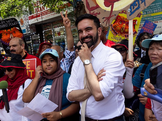 NEW YORK, NEW YORK - JUNE 21: New York City mayoral election, candidate Zohran Mamdani attends a campaign rally, calling for the full enforcement of the city's Sanctuary City laws, June 21, 2025, in Diversity Square in the Jackson Heights neighborhood of the borough of Queens, New York City. (Photo by Andrew Lichtenstein/Corbis via Getty Images)