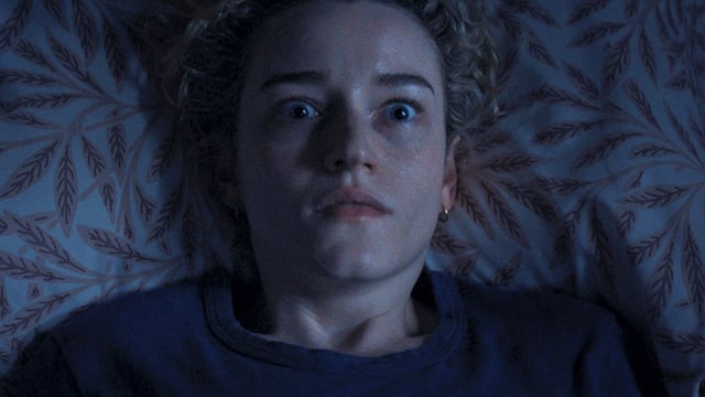 Julia Garner staring at the ceiling in Weapons.