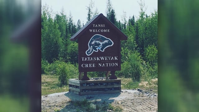 A sign for Tataskweyak Cree Nation is shown in this still. 