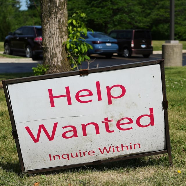 A "Help Wanted" sign is displayed at Illinois Air Team Test Station Saturday, June 21, 2025, in Lincolnshire, Ill. (AP Photo/Nam Y. Huh)
