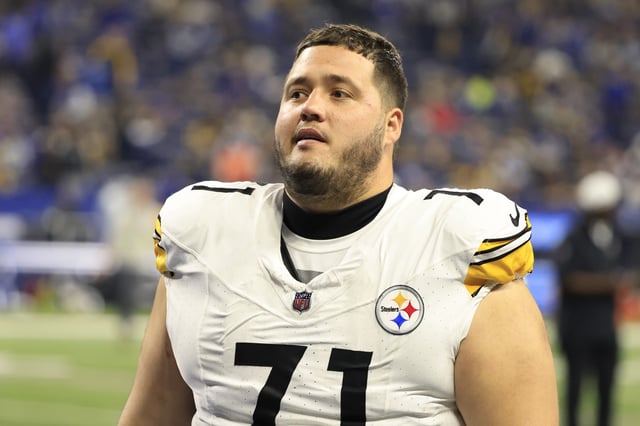 Nate Herbig #71 of the Pittsburgh Steelers walks off the field at halftime in the game against the Indianapolis Colts at Lucas Oil Stadium on December 16, 2023 in Indianapolis, Indiana.