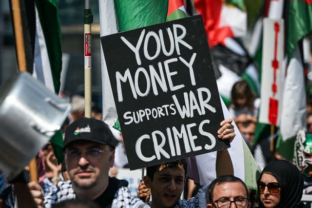 Demonstrators gather for the "Gaza Is Hungry, Stand Up for Humanity" emergency rally, on July 20, 2025, in Edmonton, Alberta, Canada.
