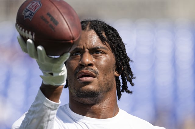 Sep 15, 2024; Baltimore, Maryland, USA;  Baltimore Ravens tight end Isaiah Likely (80)  watches the ball into his .hand while warming up before the game against the Las Vegas Raiders at M&T Bank Stadium. Mandatory Credit: Tommy Gilligan-Imagn Images/File Photo