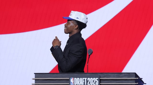 Jun 25, 2025; Brooklyn, NY, USA; VJ Edgecombe reacts on stage after being selected as the third pick by the Philadelphia 76ers in the first round of the 2025 NBA Draft at Barclays Center. Mandatory Credit: Brad Penner-Imagn Images