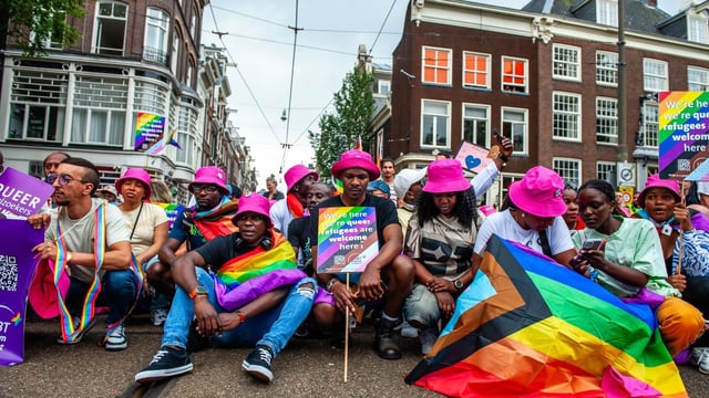 Participants in Pride Amsterdam campaigned for asylum seekers on Saturday