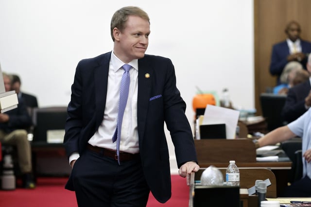FILE - Rep. Destin Hall, R-Caldwell, relaxes as the session draws to a close after lawmakers debated over redistricting bills at the Legislative Building, Oct. 24, 2023, in Raleigh, N.C. (AP Photo/Chris Seward, File)