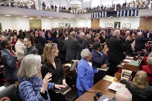 FILE - Members take the oath of office at the opening session of the N.C. House at the Legislative Building, Jan. 8, 2025, in Raleigh, N.C. (AP Photo/Chris Seward, File)