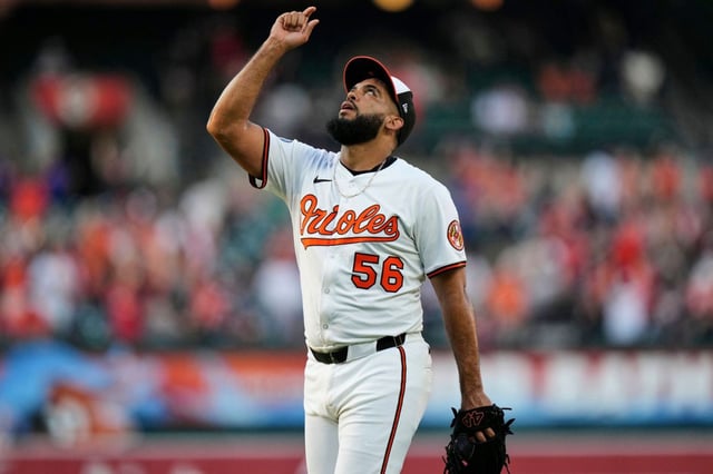 Baltimore Orioles relief pitcher Seranthony Dominguez (56) reacts to his team’s victory over the New York Mets after the second baseball game of a doubleheader, Thursday, July 10, 2025, in Baltimore. (AP Photo/Stephanie Scarbrough)