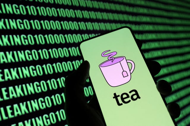 Tea app logo and cyber binary codes are seen in this illustration created on July 26, 2025. REUTERS/Dado Ruvic/Illustration/File Photo