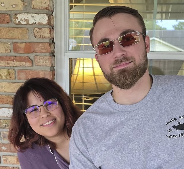 Adrian Clouatre takes a selfie of himself and his wife Paola, on May 26, 2024, in Baton Rouge, La.