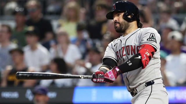 Jul 26, 2025; Pittsburgh, Pennsylvania, USA; Arizona Diamondbacks third baseman Eugenio Suarez (28) hits a single against the Pittsburgh Pirates during the sixth inning at PNC Park. Mandatory Credit: Charles LeClaire-Imagn Images