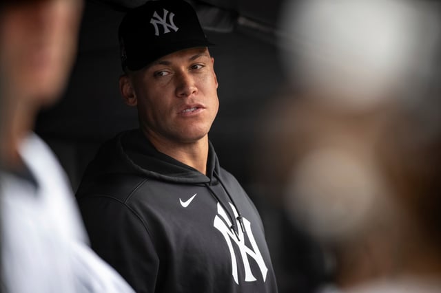 New York Yankees&#39; Aaron Judge, who is out due to an elbow injury, looks on in the dugout during the fifth inning aof a baseball game gainst the Philadelphia Phillies, Sunday, July 27, 2025, in New York. (AP Photo/Angelina Katsanis)