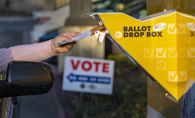 A voter puts their ballot for the 2024 Presidential Primary Election in the ballot drop box at the Vote Center located at the Orange Public Library in Orange, California, on March 5, 2024. (Mark Rightmire/Orange County Register/TNS)