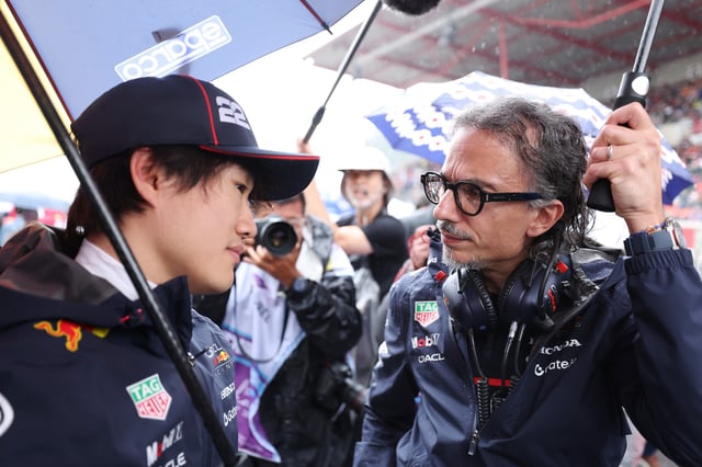 Yuki Tsunoda of Japan and Oracle Red Bull Racing talks with Laurent Mekies, Team Principal of Oracle Red Bull Racing on the grid prior to the F1 Grand Prix of Belgium at Circuit de Spa-Francorchamps on July 27, 2025 in Spa, Belgium.