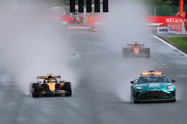 The FIA Safety Car leads Lando Norris of Great Britain driving the (4) McLaren MCL39 Mercedes and Oscar Piastri of Australia driving the (81) McLaren MCL39 Mercedes on track during the F1 Grand Prix of Belgium at Circuit de Spa-Francorchamps on July 27, 2025 in Spa, Belgium.
