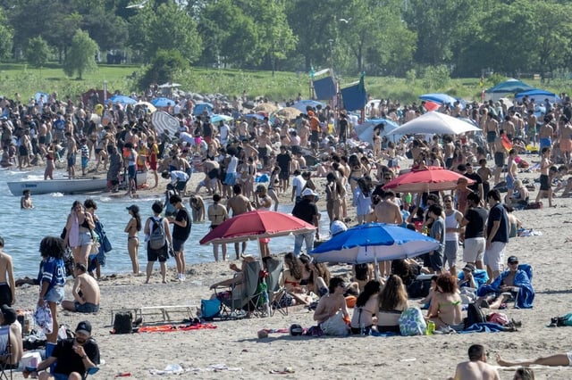 A packed Toronto beach on Monday June 23, 2025. 