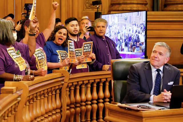 Supervisor Matt Dorsey, pictured here in June as labor groups protested potential layoffs in the city budget, has garnered criticism in the LGBTQ community over his proposal to eliminate the Equal Benefits Ordinance.