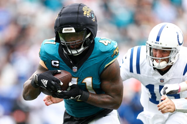 Oct 6, 2024; Jacksonville, Florida, USA; Jacksonville Jaguars defensive end Josh Hines-Allen (41) recovers a fumble from Indianapolis Colts quarterback Joe Flacco (15) in the second quarter at EverBank Stadium. Mandatory Credit: Nathan Ray Seebeck-Imagn Images/File Photo