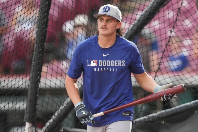 Dodgers infield prospect Alex Freeland looks on during batting practice before a game against the Cincinnati Reds on Tuesday in Cincinnati. Freeland is expected to get his first major-league start on Wednesday. (AP Photo/Carolyn Kaster)