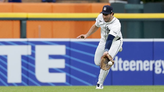 Jul 26, 2025; Detroit, Michigan, USA; Detroit Tigers outfielder Matt Vierling (8) fields a ball in the sixth inning against the Toronto Blue Jays at Comerica Park. Mandatory Credit: Rick Osentoski-Imagn Images
