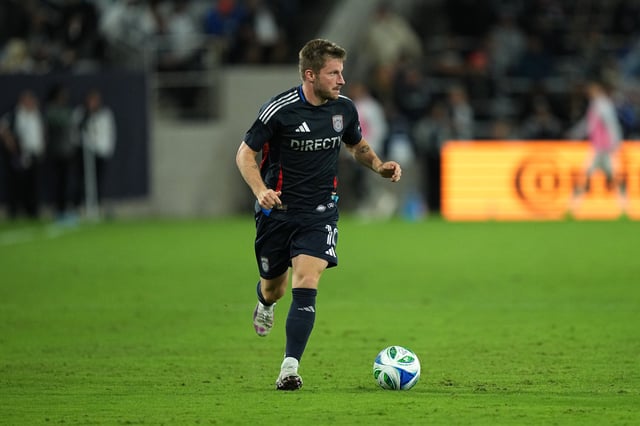 Anders Dreyer #10 of San Diego FC attacks against Los Angeles FC during the second half of a game at Snapdragon Stadium on March 29, 2025 in San Diego, California.